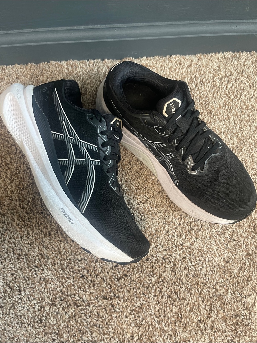 ASICS Black and White women’s Running Sneakers